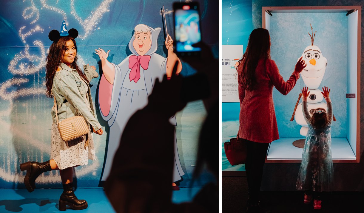 Girl poses with Fairy Godmother and girl looks up at Olaf, Disney100: The Exhibition, ExCeL London